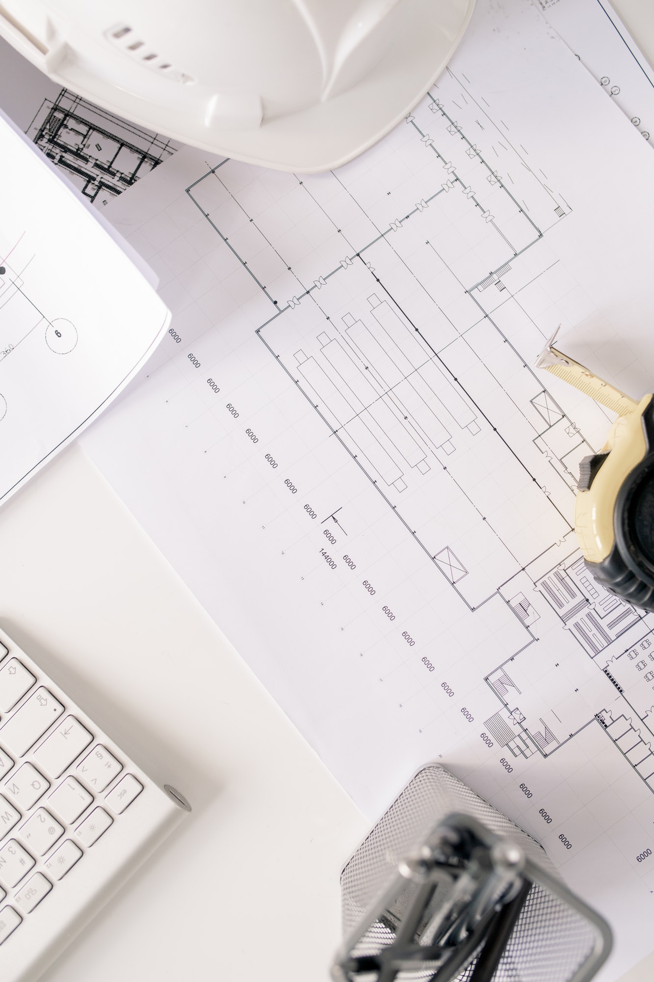Blueprint with engineering sketch and other supplies for work of architect